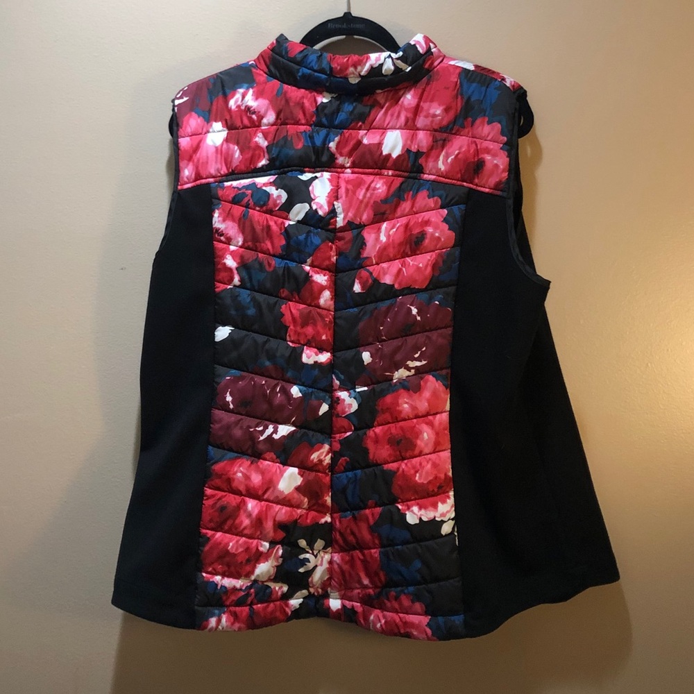 Down feather vest with stretchy sides